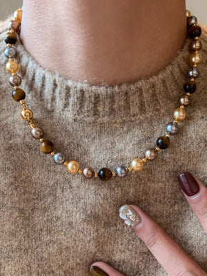 necklace in brown featuring beaded and fitted fit