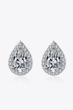 Silver teardrop halo earrings with clear pavé accents and a large center stone.