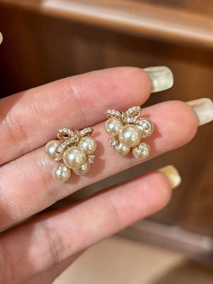 Synthetic Pearl, 925 silver needle, Zircon Care instructions: Avoid wearing duri earrings in White with regular silhouette