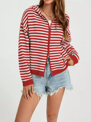 white zip-up sweater featuring zipper and striped