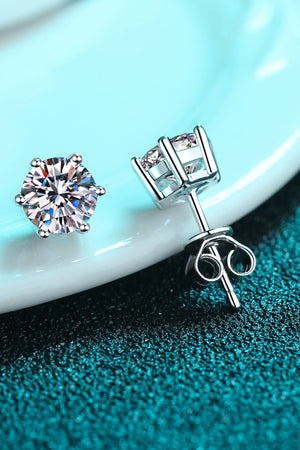 Silver six-prong solitaire stud earrings with sparkling cubic zirconia stones.