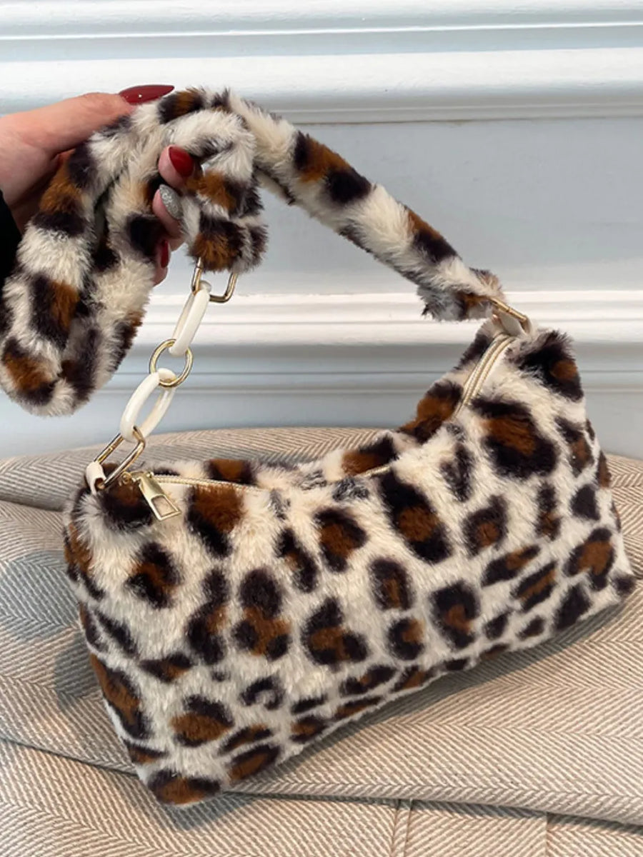 Leopard print faux fur shoulder bag with chain and white link strap detail