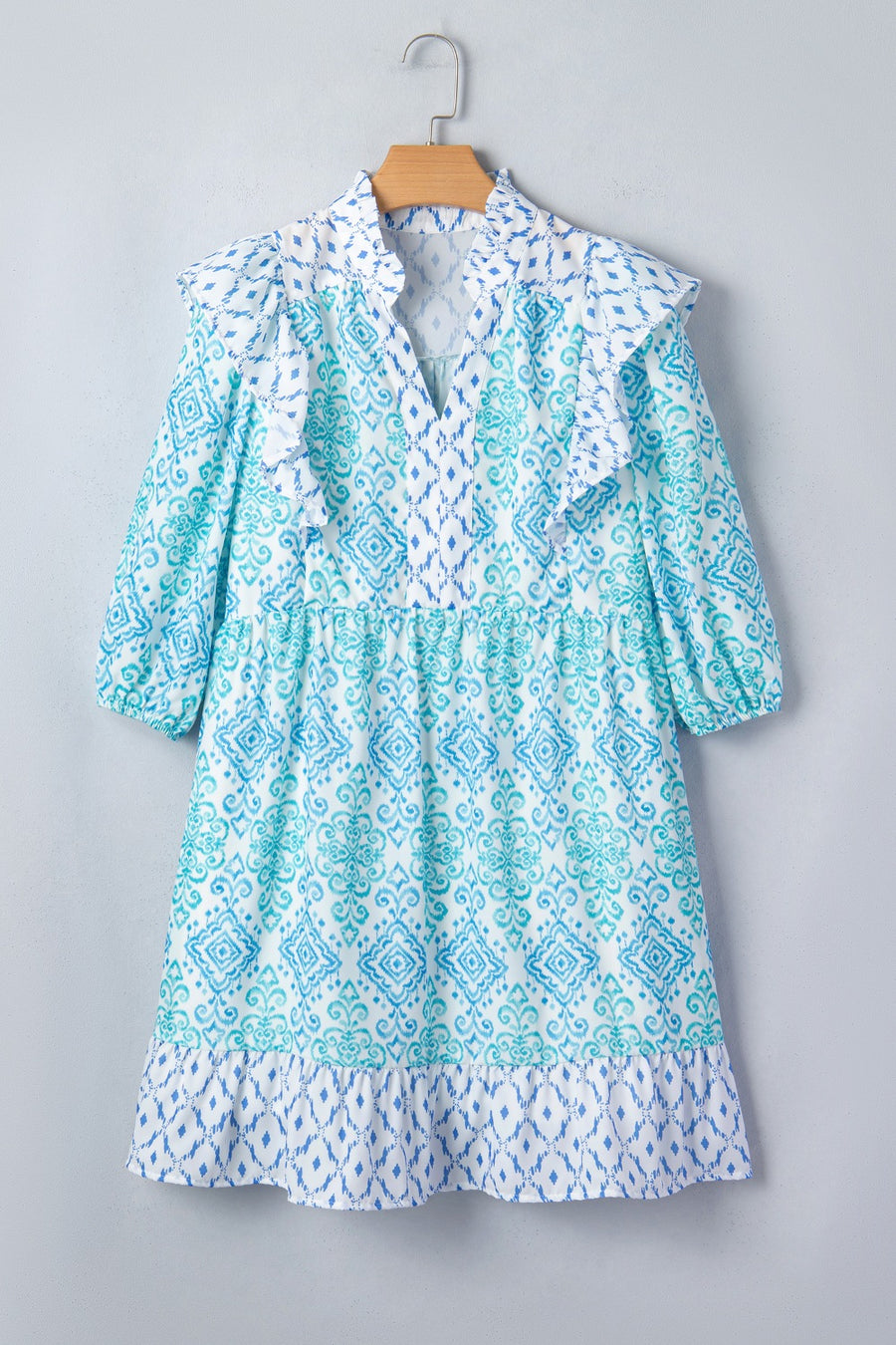Blue patchwork ruffle mini dress with balloon sleeves and a tiered hem.