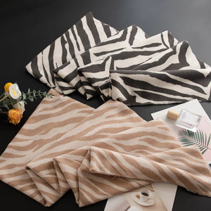 Zebra stripe wool scarf in khaki and black with fringed edges