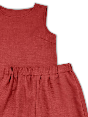 Red ruffled hem two-piece set with a textured fabric and elastic waistband.