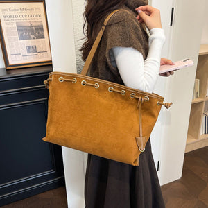 Drawstring Suede Shoulder Bag in camel with drawstring closure