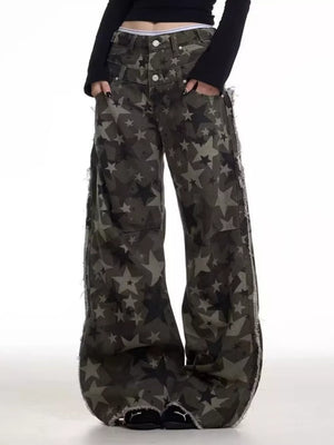 Star-embellished distressed wide-leg jeans in dark grey cotton with raw hems.
