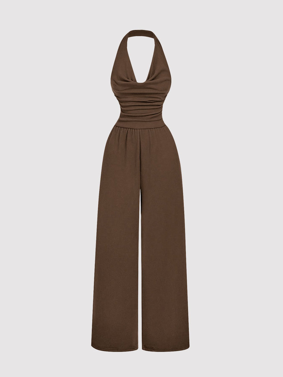 Brown halter neck wide-leg romper with ruched bodice and elastic waist
