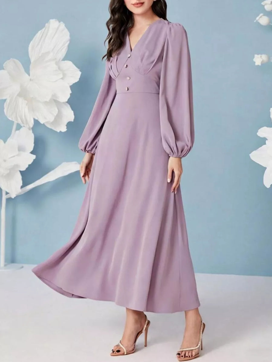 Lavender ruched maxi dress with decorative buttons and balloon sleeves.