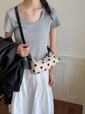 crossbody bag featuring polka dot in black with Polyester Imported Size & texture