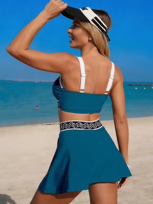 Teal tank top and skort set with white straps and patterned waistband