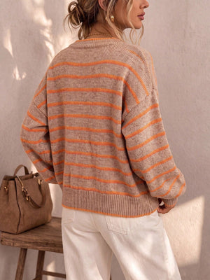Beige striped sweater with orange stripes and long sleeves