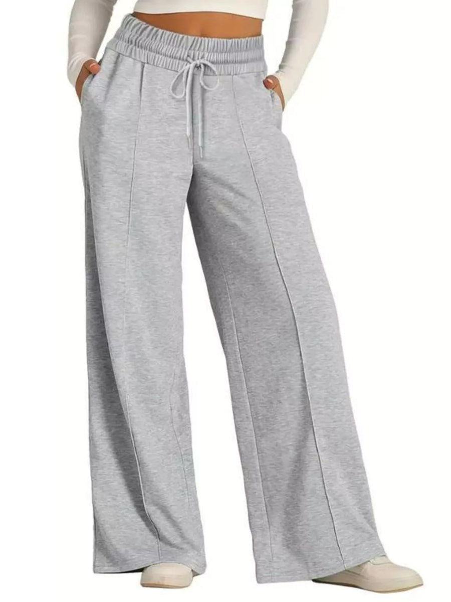 Light gray wide-leg lounge pants with drawstring and front seams