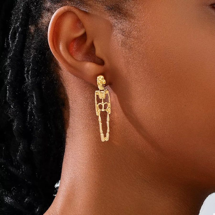 earrings featuring skeleton in Gold with 18K Gold-Plated, Alloy Care instructions: Avoid wearing during exercise, as swea