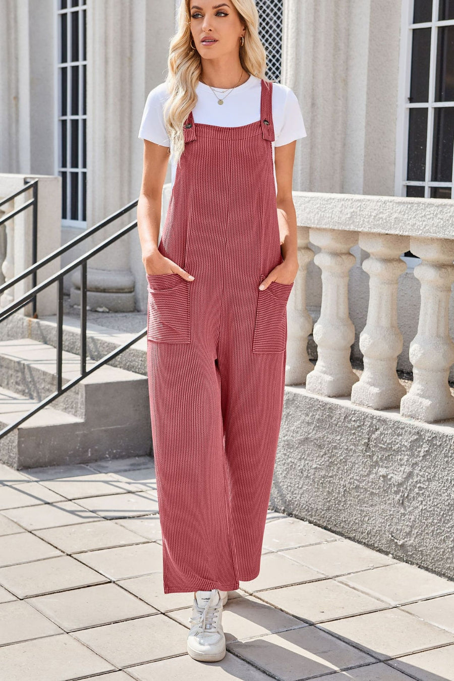 Striped denim overalls in Strawberry with patch pockets and wide legs.