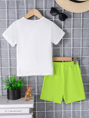 White crew neck t-shirt and lime green shorts ensemble with dinosaur detail.