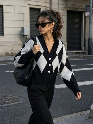 white cardigan featuring buttoned and argyle
