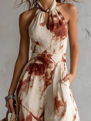 jumpsuit in ivory with abstract and pocketed