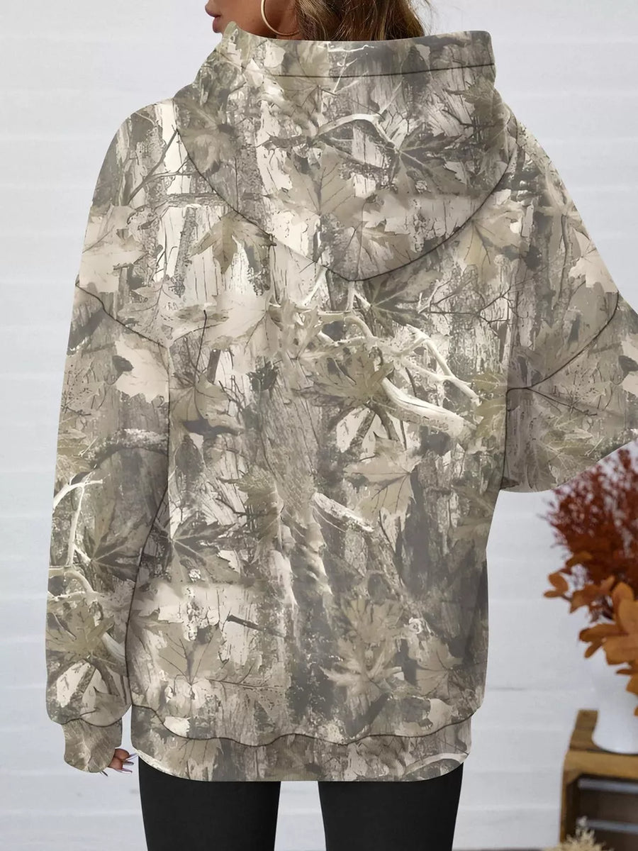95% polyester, 5% elastane Care instructions: Machine wash cold pullover hoodie in gray with oversized silhouette