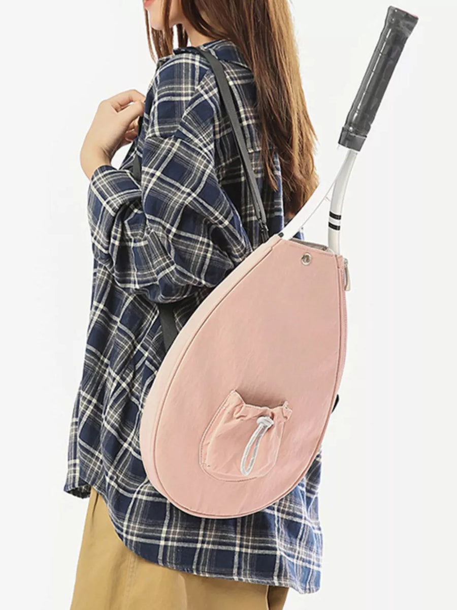 Pink athletic nylon tote with racket holder and cinch-cord pocket.