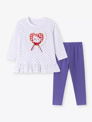 purple peplum top featuring ruffled and polka dot