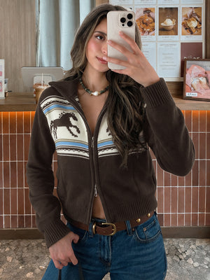 cream zip-up sweater featuring zipper and horse motif