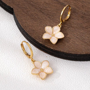earrings in Gold with floral and flower charm