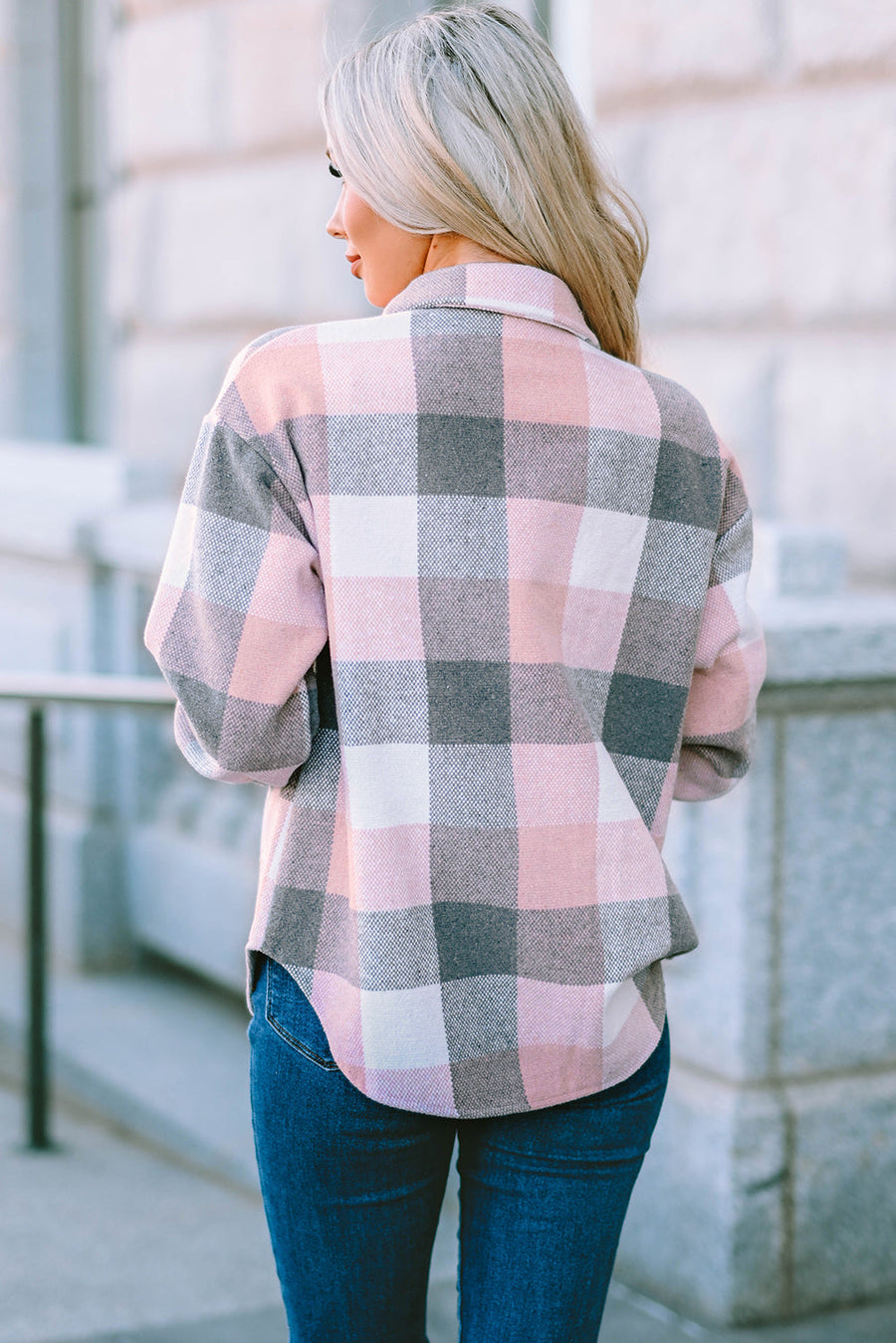 Oversized shacket in blush pink and gray plaid with button-down front.
