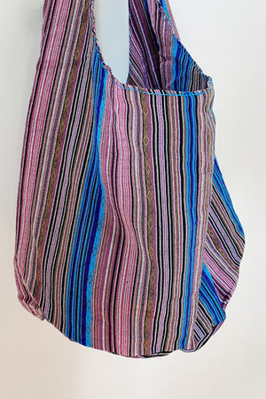 Tribal weave shoulder bag in multicolor with vertical stripes and diamond pattern detail