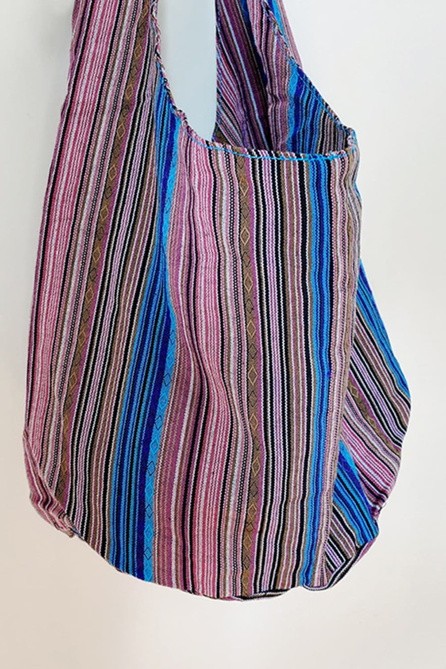 Tribal weave shoulder bag in multicolor with vertical stripes and diamond pattern detail