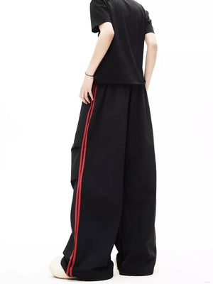 wide-leg pants featuring striped in Black with 95%polyester,5%spandex Care instructions: Machine wash cold texture