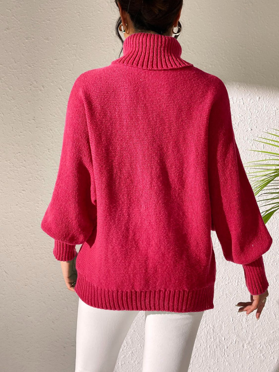Deep Red turtleneck sweater with balloon sleeves and ribbed cuffs and hem.