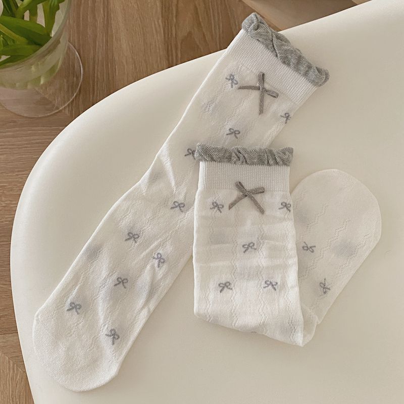 socks in Multicolor with solid, striped, polka dot, geometric, bow print and ribbed knit