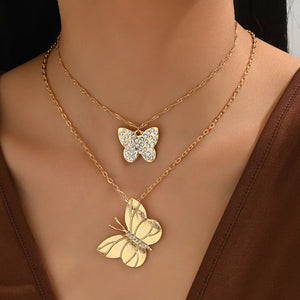 clear necklace featuring layered and butterfly