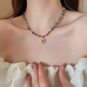 necklace in brown featuring beaded and straight fit