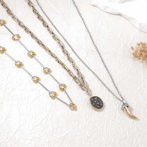 18K Gold-Plated,Zinc alloy,Stainless Steel Care instructions: Avoid wearing duri necklace in black with loose silhouette
