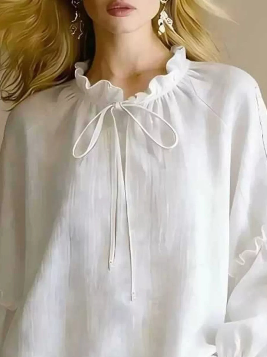 100% polyester Care instructions: Machine wash cold blouse in White with relaxed silhouette