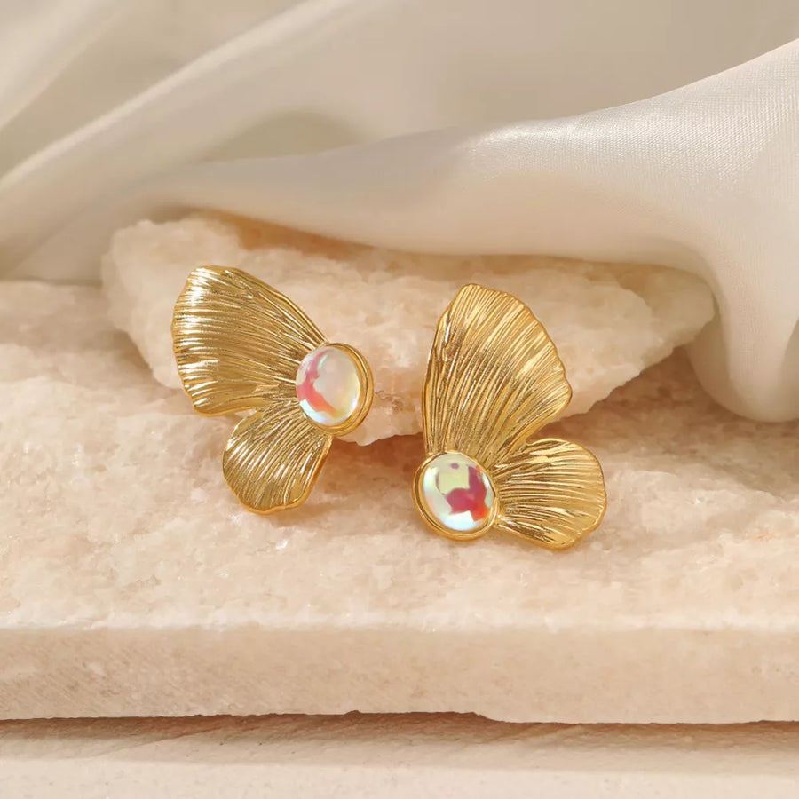 Gold earrings featuring gold-plated and textured