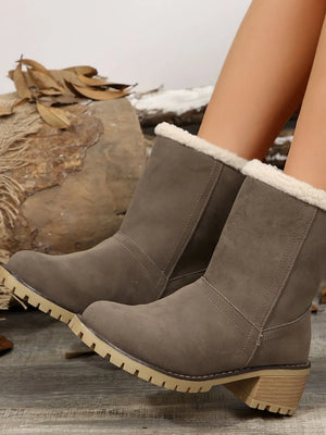 Taupe suede ankle boots with sherpa trim and lug sole