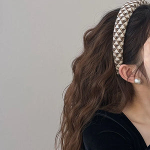 Textured tweed padded headband with geometric pattern in coffee brown and white.
