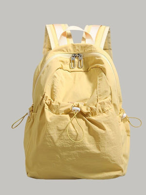Yellow lightweight nylon backpack with adjustable straps and drawstring pockets.