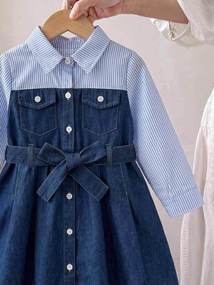 light blue shirt dress featuring buttoned and striped
