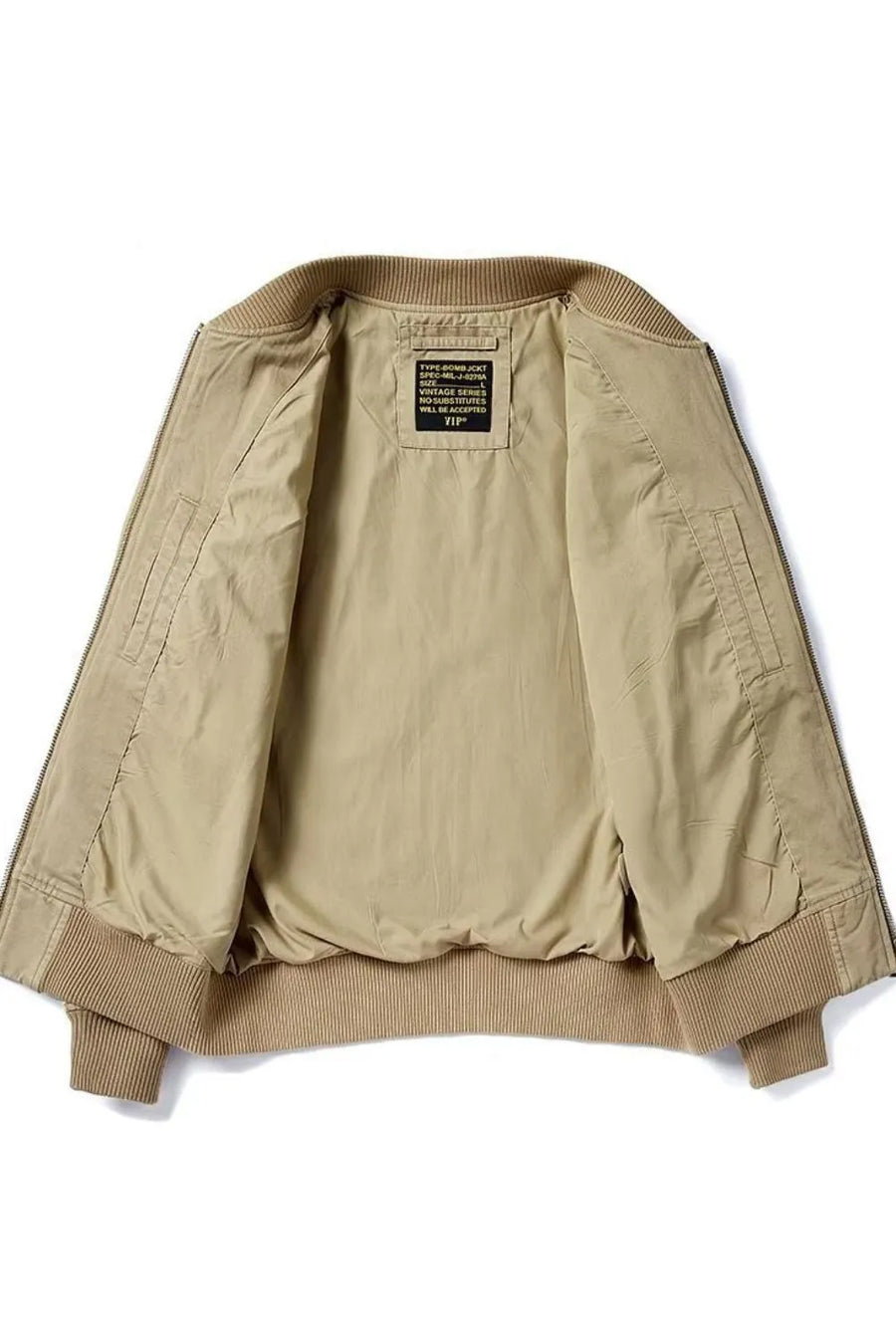 Khaki bomber jacket with ribbed cuffs and hem, featuring a patch detail on the inside label.
