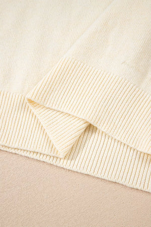 Button-cuff Crew Neck Sweater in ivory with decorative buttons