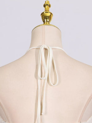Textured halter neck maxi gown with tie closure detail