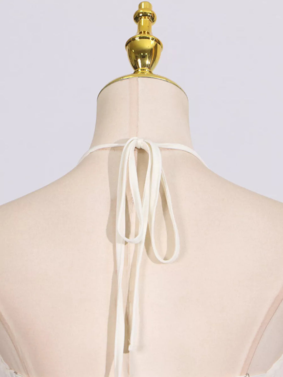 Textured halter neck maxi gown with tie closure detail