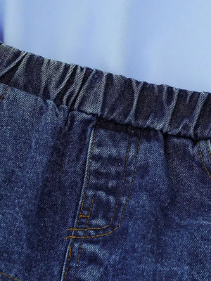 Denim skirt with elastic waistband and contrast stitching detail.