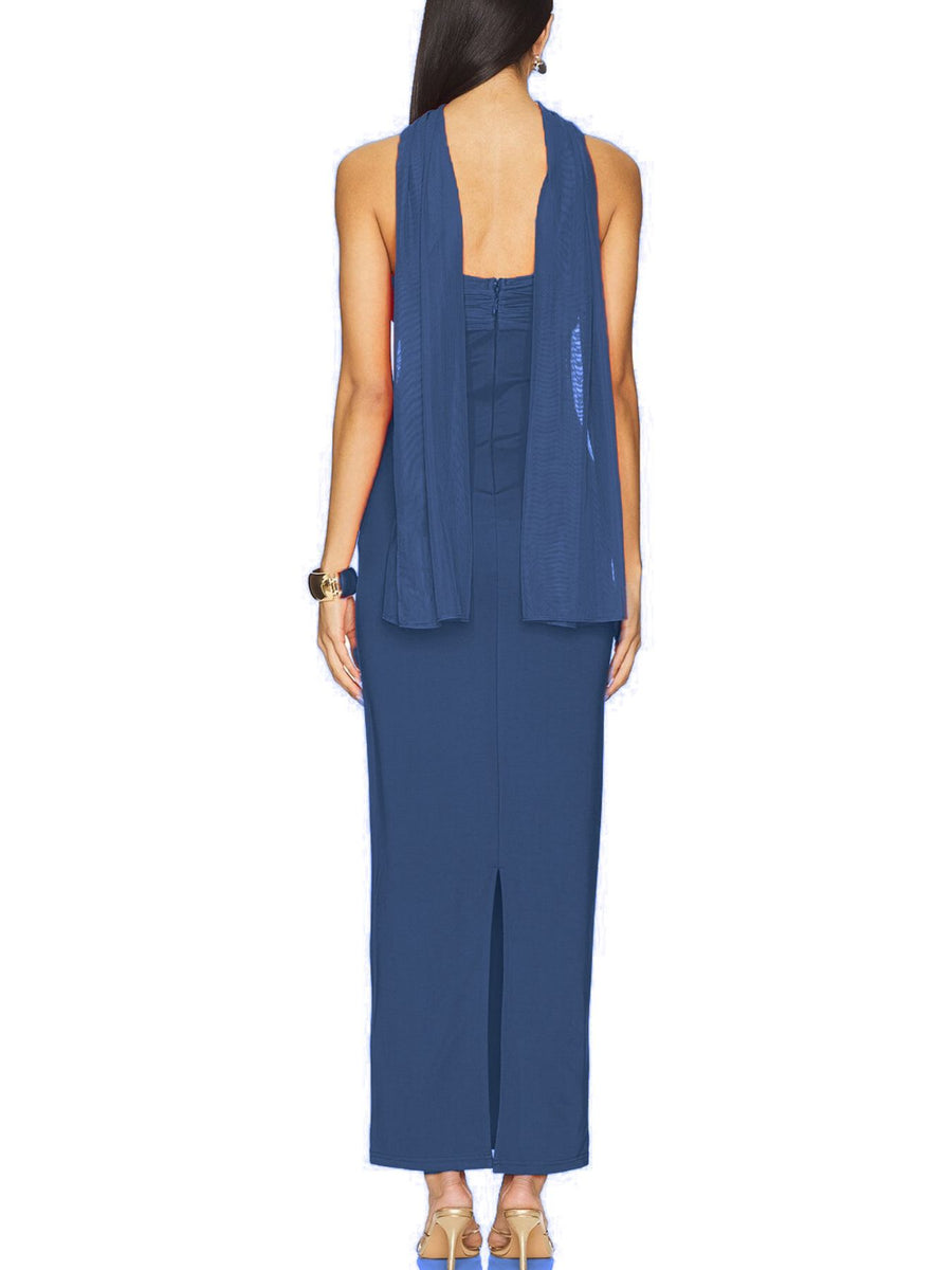 Dusty blue ruched strapless maxi dress with a sheer overlay and back slit.