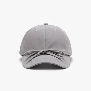 Gray baseball cap with a tied back bow detail