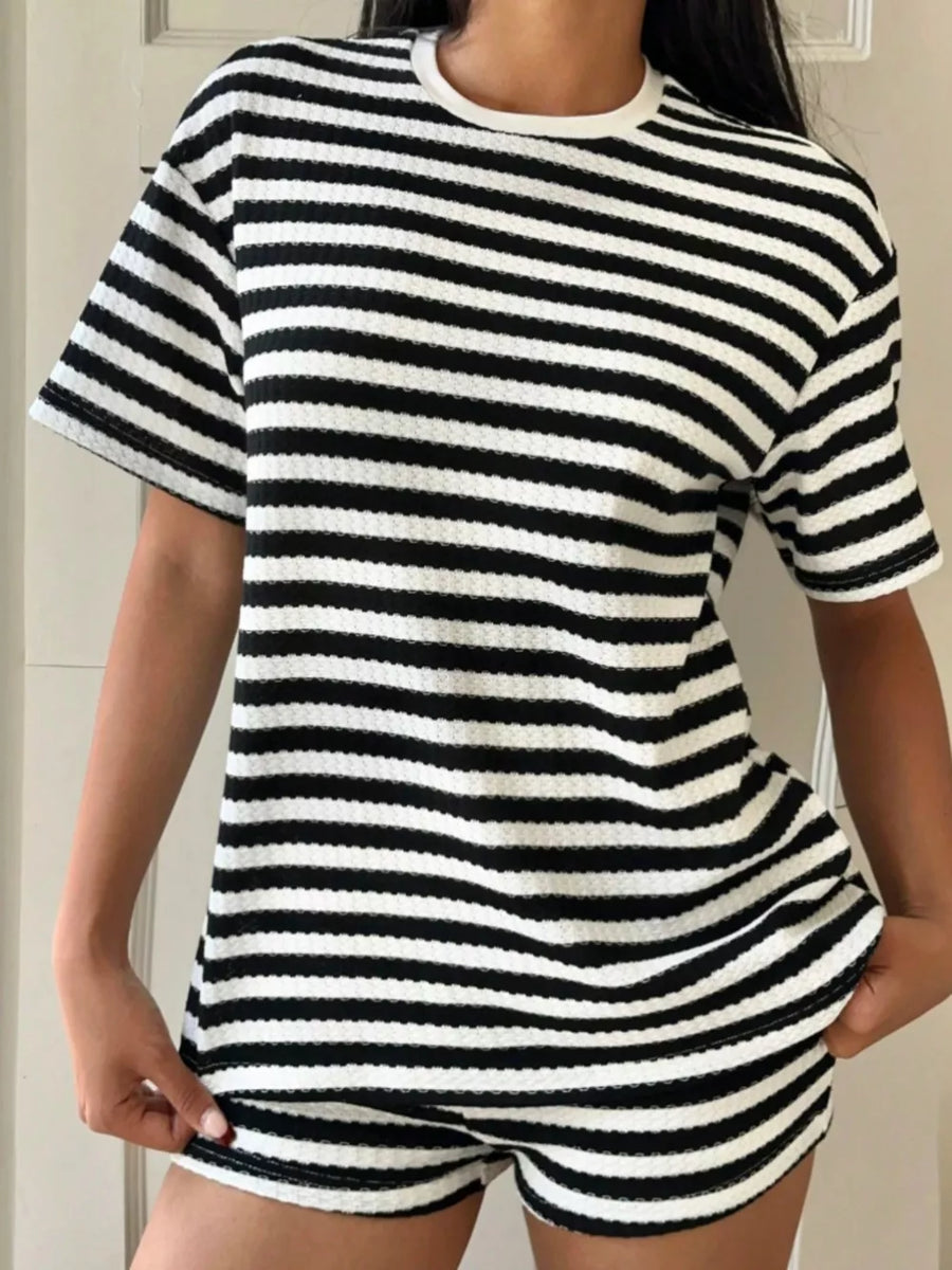 Black and white striped waffle knit loungewear set with crew neck top and shorts.